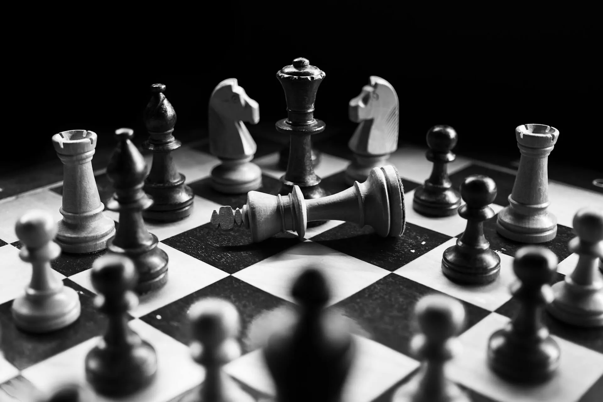 Chess pieces arranged on a board, representing competitive positioning and market strategy analysis.